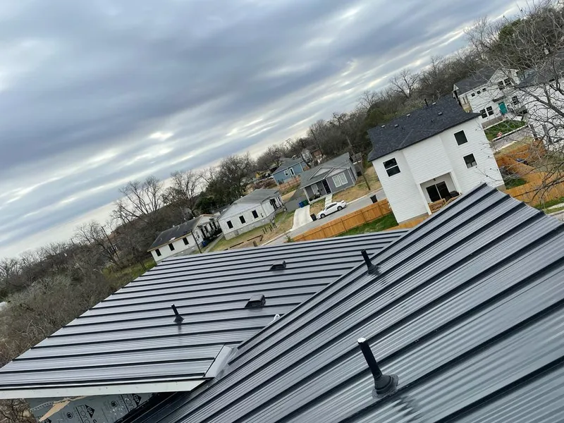 Standing seam metal roof panels with vents for Skylight Repair in Shelby